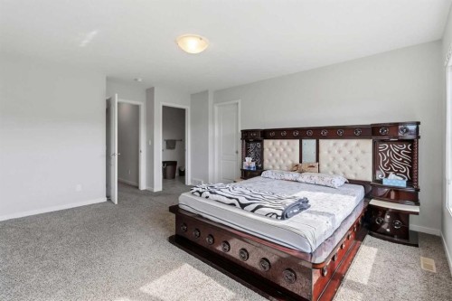 62 Wolf Hollow Way Se, Calgary, AB - Indoor Photo Showing Bedroom