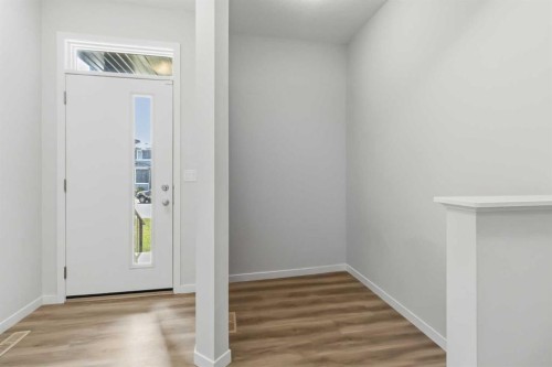 62 Wolf Hollow Way Se, Calgary, AB - Indoor Photo Showing Other Room