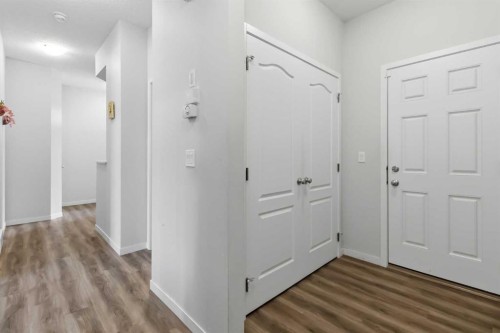 62 Wolf Hollow Way Se, Calgary, AB - Indoor Photo Showing Other Room