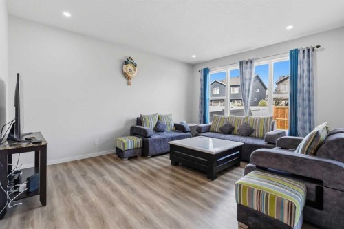 62 Wolf Hollow Way Se, Calgary, AB - Indoor Photo Showing Living Room