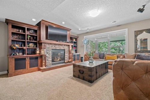 78 Auburn Sound Place Se, Calgary, AB - Indoor Photo Showing Living Room With Fireplace
