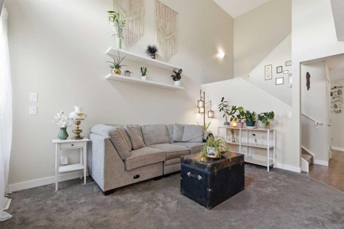 121 Canoe Square Sw, Airdrie, AB - Indoor Photo Showing Living Room