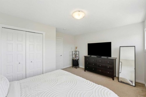 412 Cranbrook Square Se, Calgary, AB - Indoor Photo Showing Bedroom