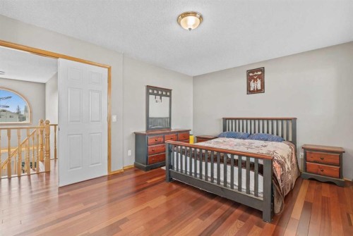 47 Coral Springs Close, Calgary, AB - Indoor Photo Showing Bedroom