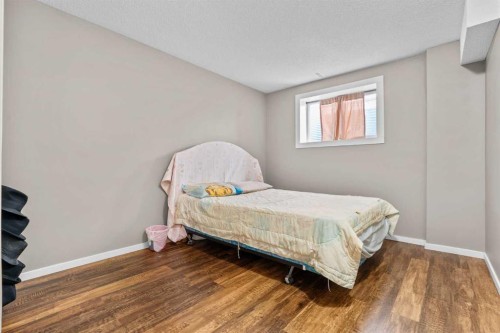47 Coral Springs Close, Calgary, AB - Indoor Photo Showing Bedroom