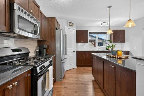 269 Silverado Way Sw, Calgary, AB - Indoor Photo Showing Kitchen With Upgraded Kitchen