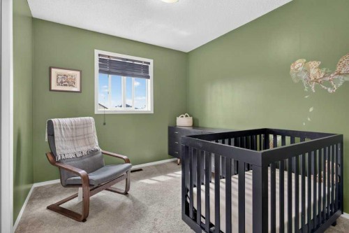 269 Silverado Way Sw, Calgary, AB - Indoor Photo Showing Bedroom