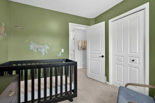 269 Silverado Way Sw, Calgary, AB - Indoor Photo Showing Bedroom