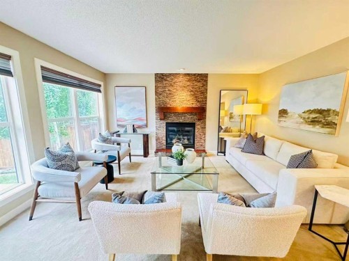 29 Everhollow Rise Sw, Calgary, AB - Indoor Photo Showing Living Room With Fireplace