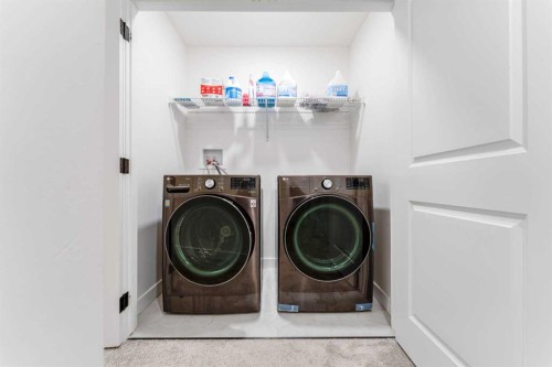 76 Lucas Boulevard Nw, Calgary, AB - Indoor Photo Showing Laundry Room