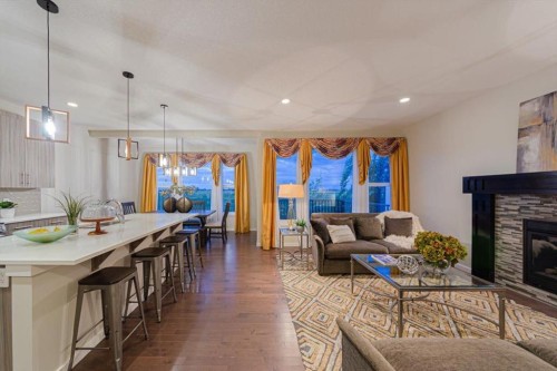 138 Copperpond Street Se, Calgary, AB - Indoor Photo Showing Living Room With Fireplace