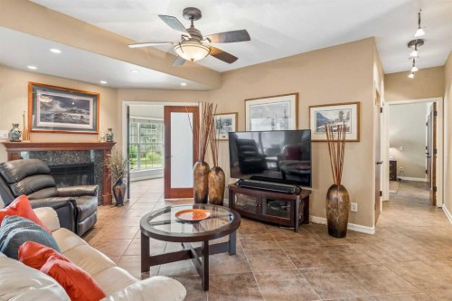 604-1997 Sirocco Drive Sw, Calgary, AB - Indoor Photo Showing Living Room With Fireplace
