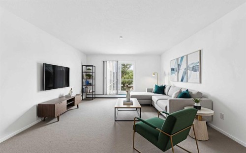 209-260 Shawville Way Se, Calgary, AB - Indoor Photo Showing Living Room