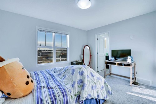 324 Dawson Drive, Chestermere, AB - Indoor Photo Showing Bedroom
