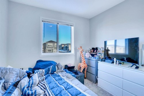 324 Dawson Drive, Chestermere, AB - Indoor Photo Showing Bedroom