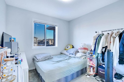 324 Dawson Drive, Chestermere, AB - Indoor Photo Showing Bedroom