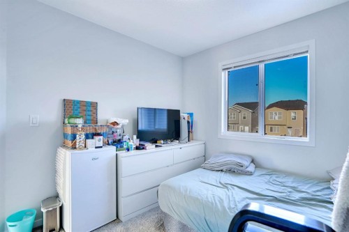 324 Dawson Drive, Chestermere, AB - Indoor Photo Showing Bedroom
