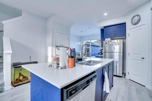 324 Dawson Drive, Chestermere, AB - Indoor Photo Showing Kitchen With Stainless Steel Kitchen With Double Sink