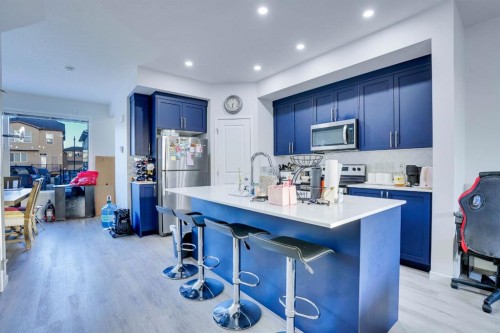 324 Dawson Drive, Chestermere, AB - Indoor Photo Showing Kitchen With Upgraded Kitchen