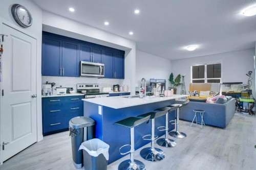324 Dawson Drive, Chestermere, AB - Indoor Photo Showing Kitchen With Upgraded Kitchen