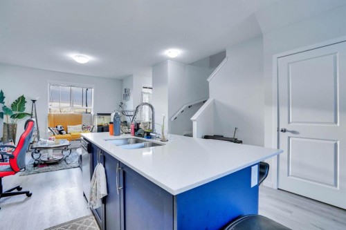 324 Dawson Drive, Chestermere, AB - Indoor Photo Showing Kitchen With Double Sink