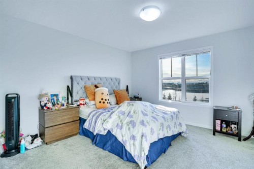 324 Dawson Drive, Chestermere, AB - Indoor Photo Showing Bedroom