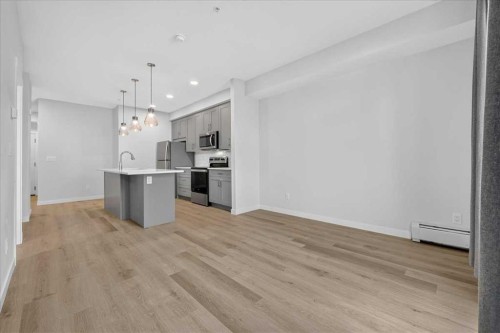 101-200 Shawnee Square Sw, Calgary, AB - Indoor Photo Showing Kitchen