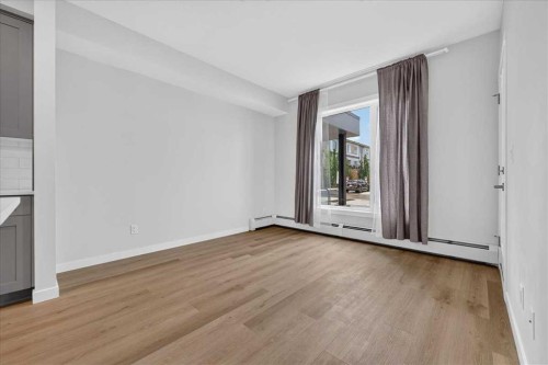 101-200 Shawnee Square Sw, Calgary, AB - Indoor Photo Showing Other Room
