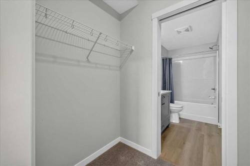 101-200 Shawnee Square Sw, Calgary, AB - Indoor Photo Showing Other Room