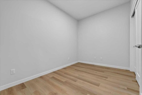 101-200 Shawnee Square Sw, Calgary, AB - Indoor Photo Showing Other Room