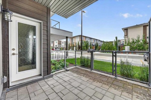 101-200 Shawnee Square Sw, Calgary, AB - Outdoor With Balcony With Exterior