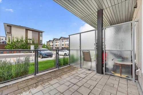 101-200 Shawnee Square Sw, Calgary, AB - Outdoor With Balcony With Exterior