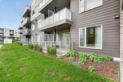 101-200 Shawnee Square Sw, Calgary, AB - Outdoor With Balcony