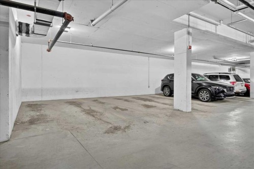 101-200 Shawnee Square Sw, Calgary, AB - Indoor Photo Showing Garage