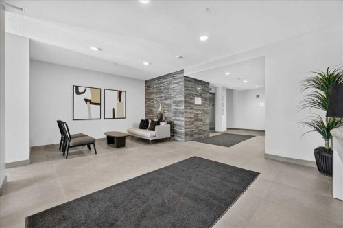 101-200 Shawnee Square Sw, Calgary, AB - Indoor Photo Showing Other Room