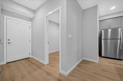 101-200 Shawnee Square Sw, Calgary, AB - Indoor Photo Showing Other Room