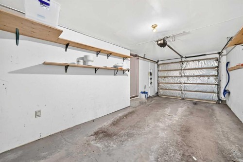 133 Point Drive Nw, Calgary, AB - Indoor Photo Showing Garage