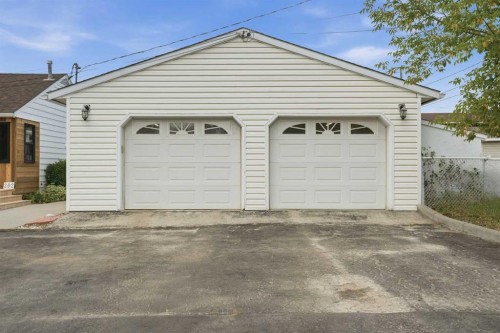 302 Frontenac Avenue Nw, Diamond Valley, AB - Outdoor With Exterior