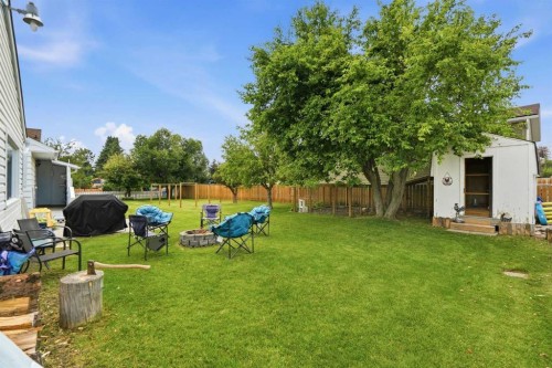 302 Frontenac Avenue Nw, Diamond Valley, AB - Outdoor With Backyard