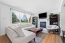 96 Waterloo Drive Sw, Calgary, AB  - Indoor Photo Showing Living Room With Fireplace 
