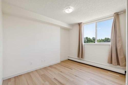 405-340 4 Avenue Ne, Calgary, AB - Indoor Photo Showing Other Room