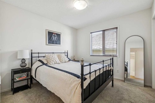 135 Tuscany Ravine Road Nw, Calgary, AB - Indoor Photo Showing Bedroom