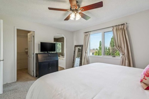 135 Tuscany Ravine Road Nw, Calgary, AB - Indoor Photo Showing Bedroom