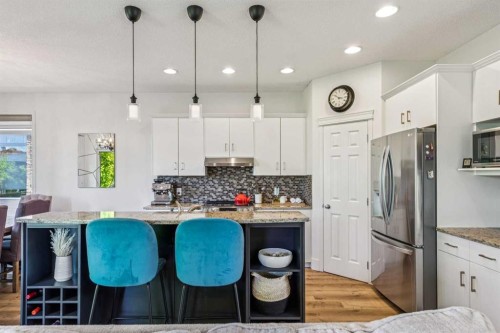 135 Tuscany Ravine Road Nw, Calgary, AB - Indoor Photo Showing Kitchen With Upgraded Kitchen