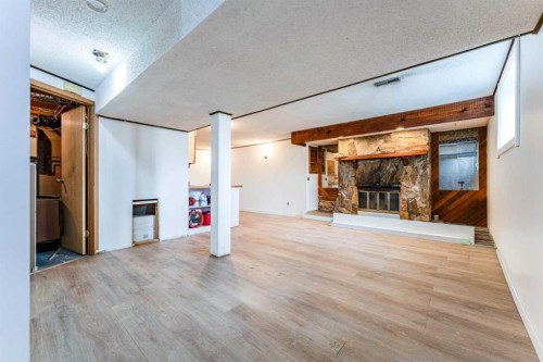 6823 4 Avenue Se, Calgary, AB - Indoor With Fireplace
