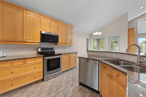 109 Cranwell Place Se, Calgary, AB - Indoor Photo Showing Kitchen With Double Sink