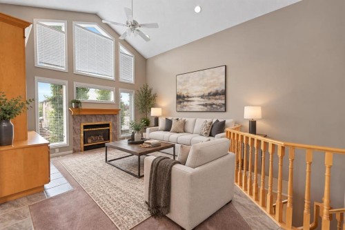 109 Cranwell Place Se, Calgary, AB - Indoor Photo Showing Living Room With Fireplace