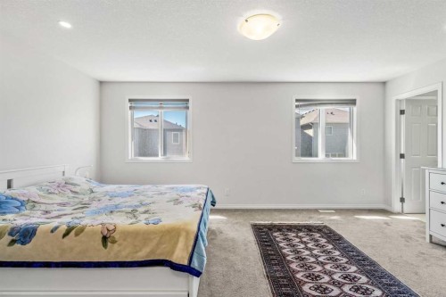 192 Carrington Crescent Nw, Calgary, AB - Indoor Photo Showing Bedroom