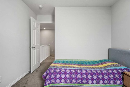 192 Carrington Crescent Nw, Calgary, AB - Indoor Photo Showing Bedroom