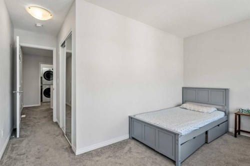 192 Carrington Crescent Nw, Calgary, AB - Indoor Photo Showing Bedroom